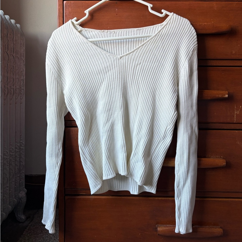 white v-neck sweater. fits like a medium, but no tag.